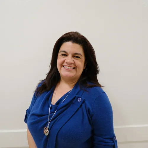 Jennifer headshot in the hallway